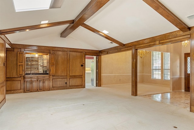 10009 Apple Creek Dr, Dallas, TX 75243 - unfurnished living room with wood walls and light colored carpet