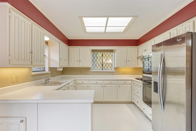 10009 Apple Creek Dr, Dallas, TX 75243 - kitchen featuring stainless steel fridge, a peninsula, light countertops, ornamental molding, and light tile patterned floors