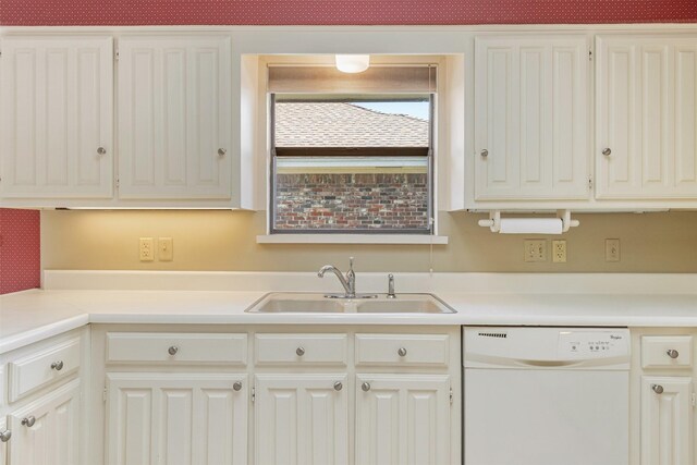10009 Apple Creek Dr, Dallas, TX 75243 - kitchen featuring white dishwasher, light countertops, and white cabinets