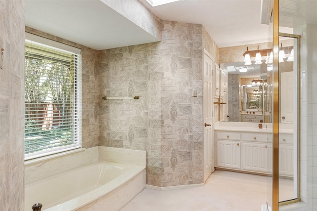 10009 Apple Creek Dr, Dallas, TX 75243 - full bath with plenty of natural light, a bath, vanity, and a chandelier