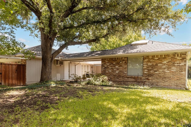 10009 Apple Creek Dr, Dallas, TX 75243 - view of front of house featuring brick siding and a wall unit AC