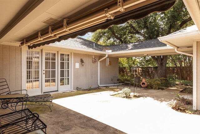 10009 Apple Creek Dr, Dallas, TX 75243 - view of patio featuring french doors