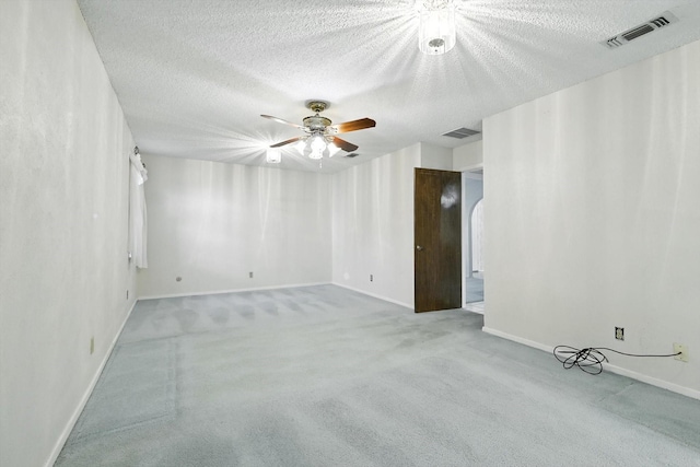 233 Hillview Dr, Hurst, TX 76054 - carpeted empty room with a textured ceiling and a ceiling fan