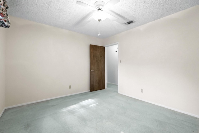233 Hillview Dr, Hurst, TX 76054 - carpeted empty room featuring a textured ceiling and ceiling fan