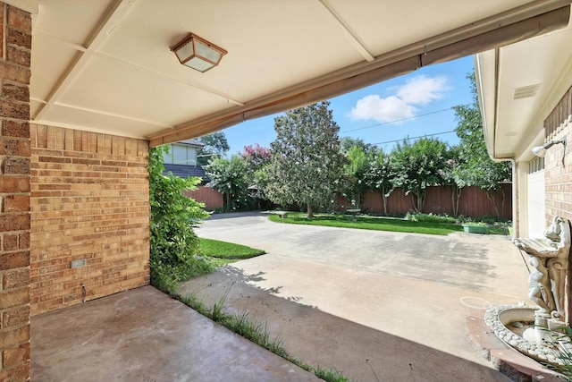 233 Hillview Dr, Hurst, TX 76054 - fenced backyard with a patio