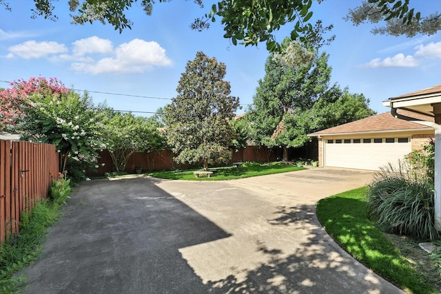 233 Hillview Dr, Hurst, TX 76054 - view of yard with a garage