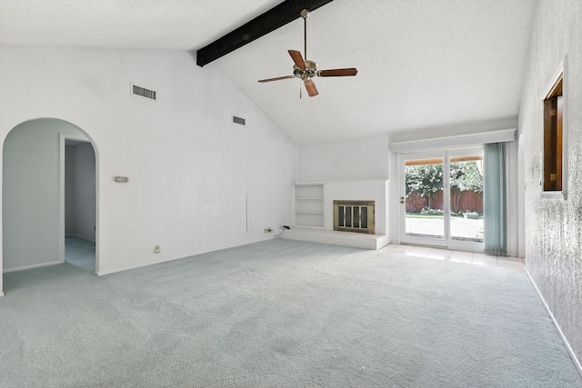 233 Hillview Dr, Hurst, TX 76054 - unfurnished living room featuring ceiling fan, high vaulted ceiling, beam ceiling, light carpet, and arched walkways