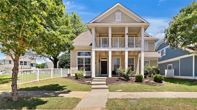 10027 Hanover Dr, Providence Village, TX 76227 - greek revival house with a balcony, covered porch, and roof with shingles
