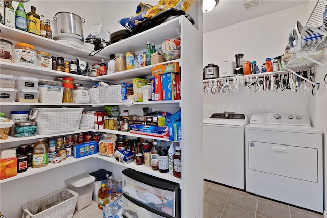 10027 Hanover Dr, Providence Village, TX 76227 - storage area with washer and clothes dryer