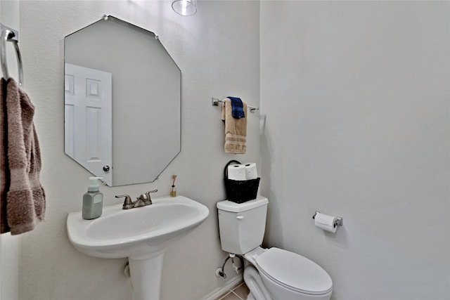 10027 Hanover Dr, Providence Village, TX 76227 - bathroom with toilet and tile patterned flooring