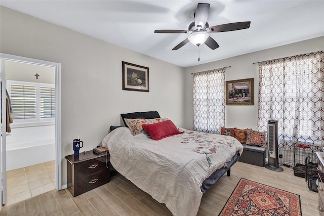 10027 Hanover Dr, Providence Village, TX 76227 - bedroom with light wood-style floors and ceiling fan