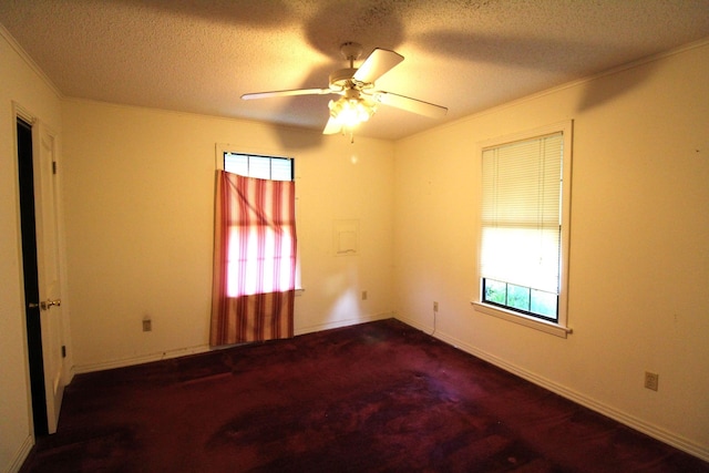 1 Mason St, Minden, LA 71055 - spare room with plenty of natural light, a ceiling fan, a textured ceiling, carpet, and crown molding