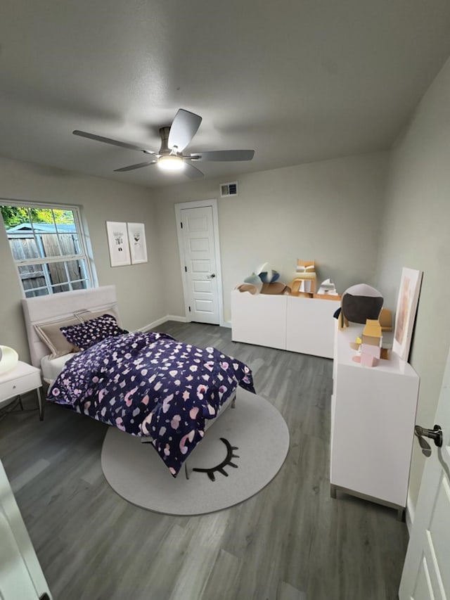 8718 Greenmound Ave, Dallas, TX 75227 - bedroom with wood finished floors and ceiling fan