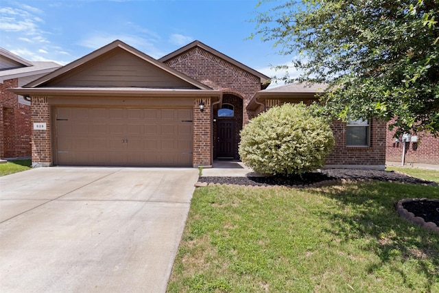 628 Cameron Way, Azle, TX 76020 - view of front of home featuring a garage, concrete driveway, a front lawn, and brick siding