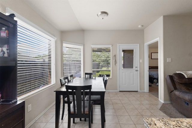 628 Cameron Way, Azle, TX 76020 - dining room featuring light tile patterned floors and lofted ceiling