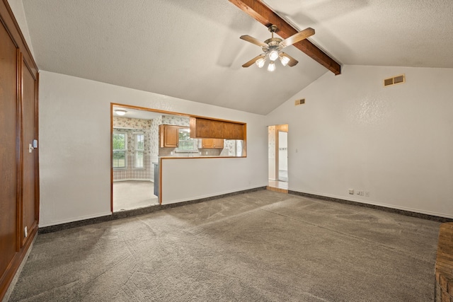 7655 Veal Station Rd, Azle, TX 76020 - unfurnished living room with ceiling fan, a textured ceiling, and dark colored carpet