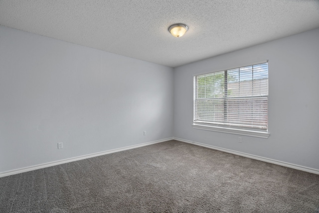 8347 Mountainview Dr, Dallas, TX 75249 - spare room featuring a textured ceiling and carpet flooring