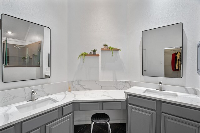 8347 Mountainview Dr, Dallas, TX 75249 - bathroom featuring vanity and a shower with shower door