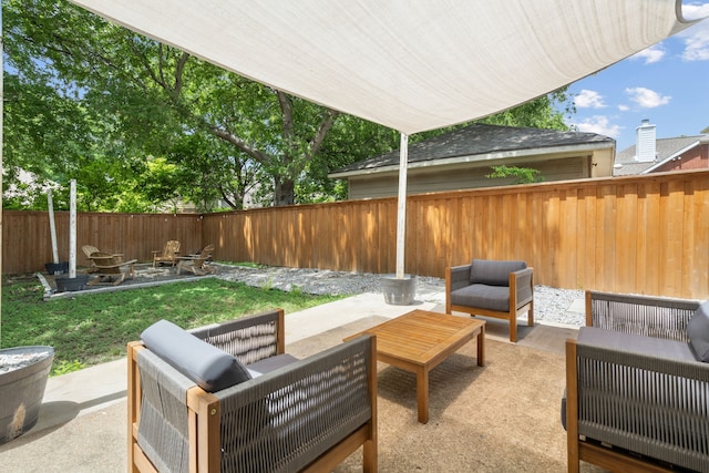 8347 Mountainview Dr, Dallas, TX 75249 - fenced backyard featuring a patio area and an outdoor hangout area