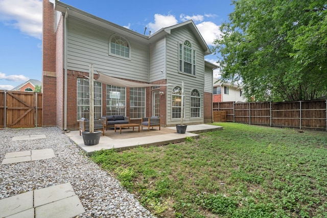 8347 Mountainview Dr, Dallas, TX 75249 - back of house featuring a patio area, brick siding, an outdoor hangout area, and a gate