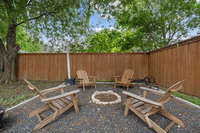 8347 Mountainview Dr, Dallas, TX 75249 - fenced backyard with a fire pit
