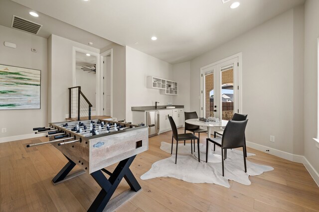 1732 Oakbrook Dr, Keller, TX 76262 - recreation room featuring light wood-style flooring, recessed lighting, and ceiling fan
