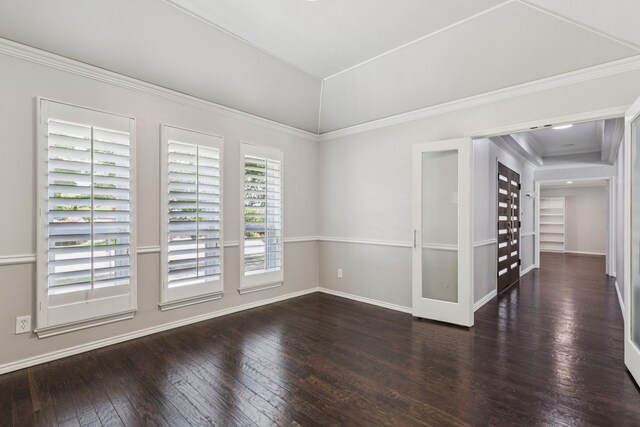6714 Barkworth Dr, Dallas, TX 75248 - spare room featuring wood-type flooring, vaulted ceiling, and crown molding