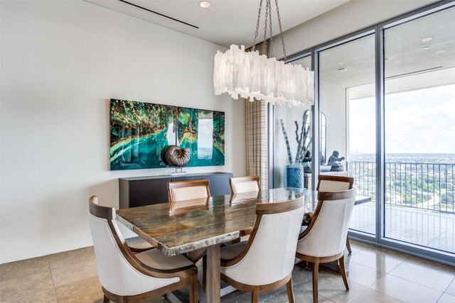 1717 Arts Plz Unit 1808, Dallas, TX 75201 - dining room with light tile patterned flooring and expansive windows
