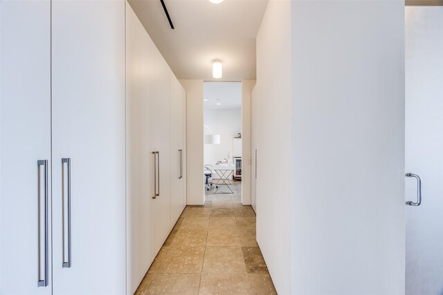 1717 Arts Plz Unit 1808, Dallas, TX 75201 - corridor featuring light tile patterned floors
