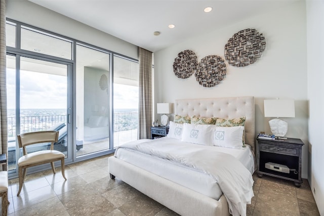 1717 Arts Plz Unit 1808, Dallas, TX 75201 - bedroom with access to exterior and recessed lighting