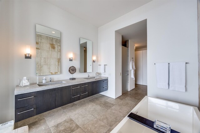 1717 Arts Plz Unit 1808, Dallas, TX 75201 - full bath with double vanity and a tub