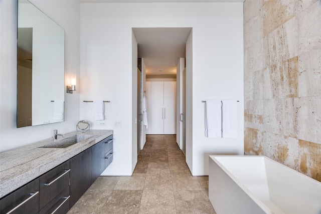 1717 Arts Plz Unit 1808, Dallas, TX 75201 - bathroom with a soaking tub and vanity