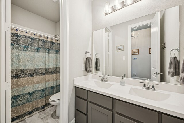12229 Prudence Dr, Fort Worth, TX 76052 - full bath featuring marble finish flooring, double vanity, and curtained shower