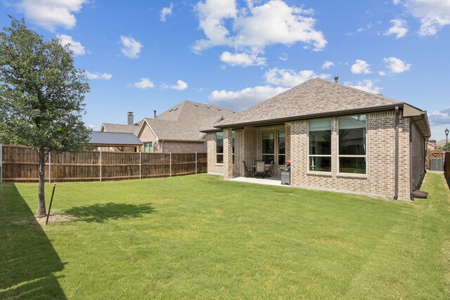 12229 Prudence Dr, Fort Worth, TX 76052 - rear view of property with brick siding, a patio area, and roof with shingles