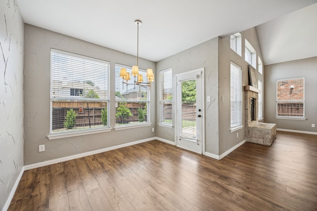 1613 Country Brook Ln, Allen, TX 75002 - unfurnished dining area featuring a chandelier and wood finished floors