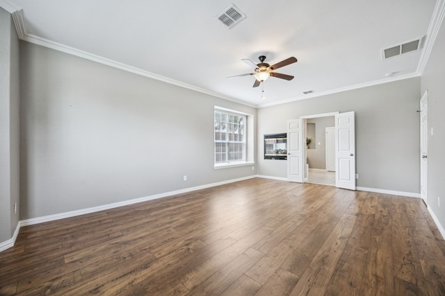 1613 Country Brook Ln, Allen, TX 75002 - empty room with a ceiling fan, dark wood-style floors, and crown molding