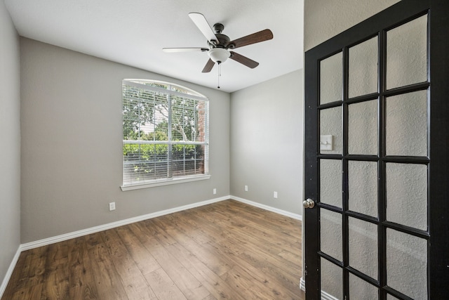 1613 Country Brook Ln, Allen, TX 75002 - unfurnished room featuring wood finished floors and a ceiling fan