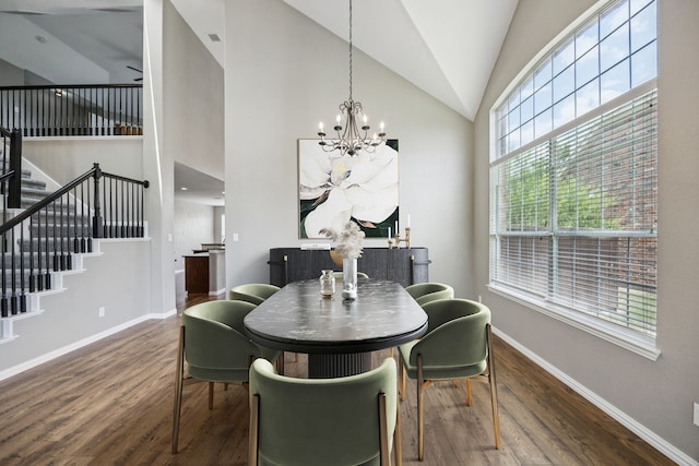 1613 Country Brook Ln, Allen, TX 75002 - dining room featuring wood finished floors, a chandelier, stairs, and high vaulted ceiling