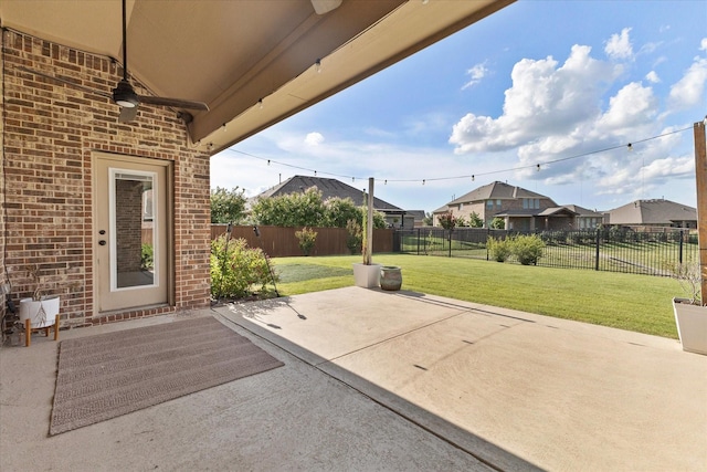 3204 Wimberley Ln, Rockwall, TX 75032 - fenced backyard with a patio area and a residential view