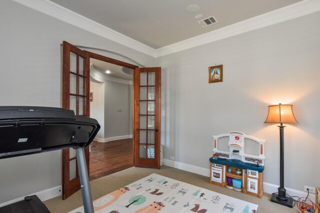 9750 Candlewood Dr, Frisco, TX 75033 - recreation room with french doors, crown molding, and carpet floors