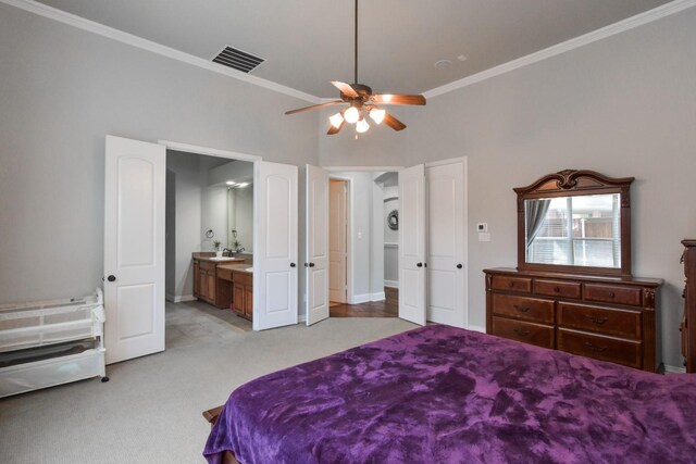 9750 Candlewood Dr, Frisco, TX 75033 - bedroom with crown molding, light carpet, ensuite bath, and a ceiling fan