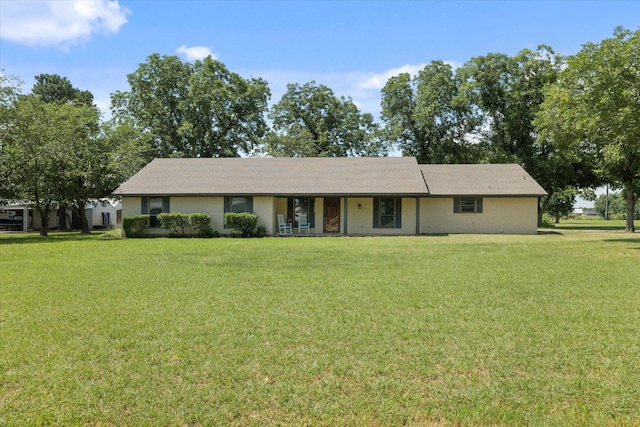 713 E Peel St, Pilot Point, TX 76258 - ranch-style home with a front lawn and a porch