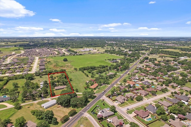 713 E Peel St, Pilot Point, TX 76258 - aerial perspective of suburban area featuring property parcel outlined