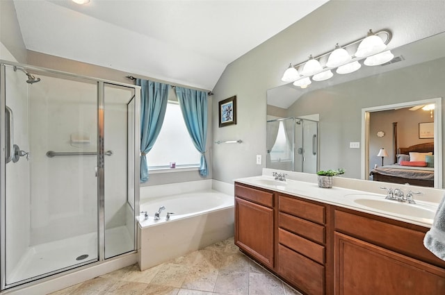 9210 Wild River Dr, Arlington, TX 76002 - ensuite bathroom featuring lofted ceiling, a bath, a shower stall, and double vanity