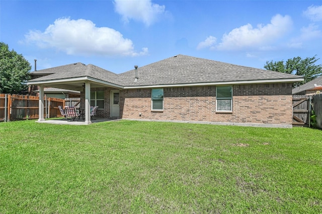 9210 Wild River Dr, Arlington, TX 76002 - rear view of property featuring brick siding, a patio, roof with shingles, and a fenced backyard