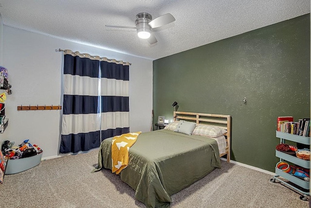 5800 Thoreau Ln, Arlington, TX 76016 - bedroom featuring carpet floors, a textured ceiling, ceiling fan, and a textured wall
