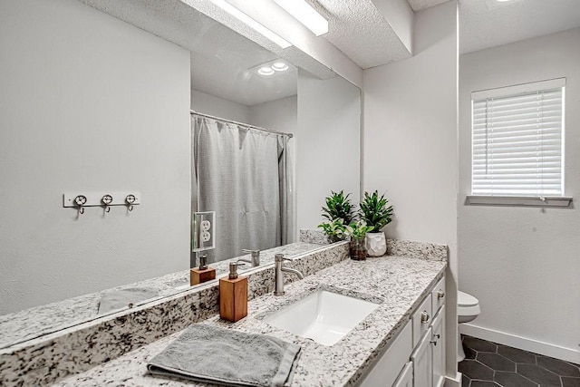 5800 Thoreau Ln, Arlington, TX 76016 - full bathroom with vanity, tile patterned flooring, and a shower with curtain