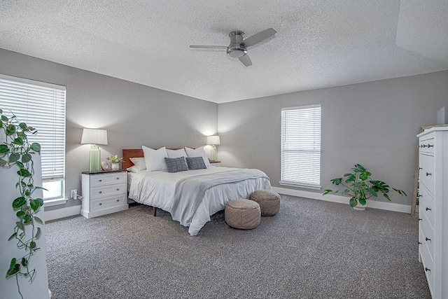 5800 Thoreau Ln, Arlington, TX 76016 - carpeted bedroom featuring a textured ceiling and a ceiling fan