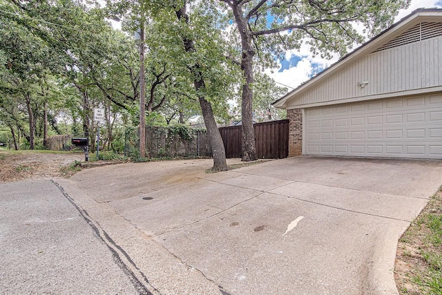 5800 Thoreau Ln, Arlington, TX 76016 - garage with concrete driveway