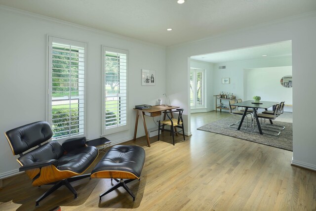 4232 Meadowdale Ln, Dallas, TX 75229 - living area featuring crown molding, wood finished floors, and recessed lighting